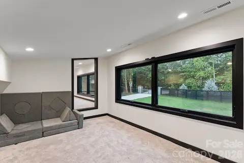 Fully conditioned clubhouse / flex bonus room above the garage with dedicated heating and cooling and TV lounge area