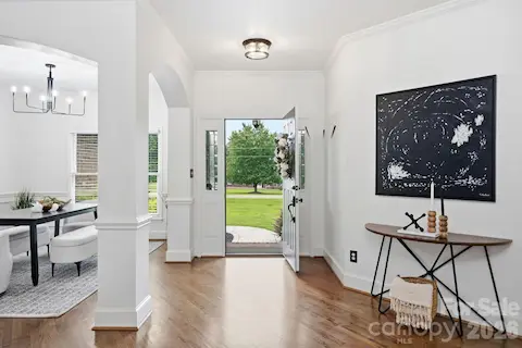 Bright foyer with sitting room and formal dining room