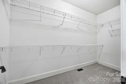 Primary walk-in closet