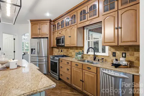 Cabinets to the ceiling, new light fixtures, updated appliances