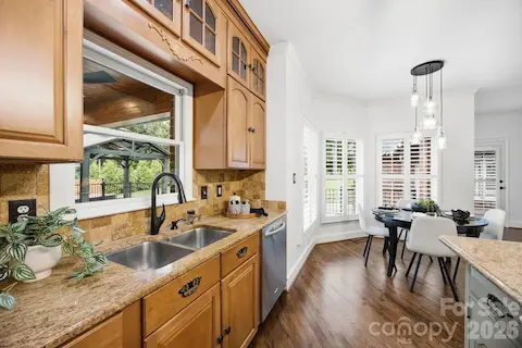 Open to the kitchen seating and the Living Room