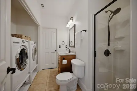 Laundry room with full bath (Jack and Jill) with bedroom and bonus room.