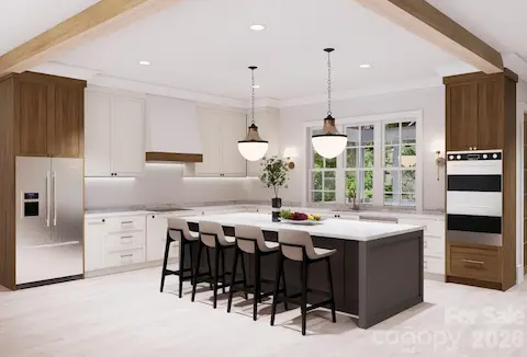 Please note: The builder has revised the kitchen layout. The refrigerator will be located in the space shown for the ovens in the rendering, and the double ovens will be relocated to the space shown for the refrigerator.