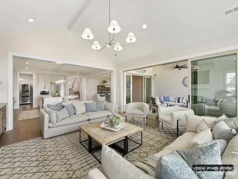 Open Concept that flows to covered outdoor, kitchen and dining room