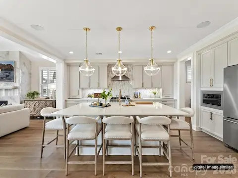 Gorgeous Kitchen with an expanded kitchen island with 5 seats