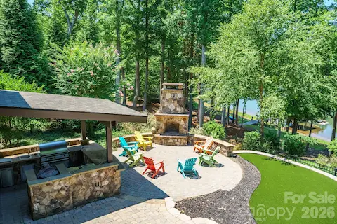 Custom Outdoor Kitchen and Beautiful Fireplace