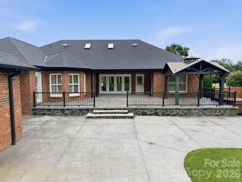 Patios of your dreams, leading to a large, flat, private yard.