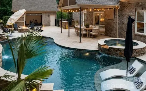 Heated saltwater pool and hot tub- virtually staged
