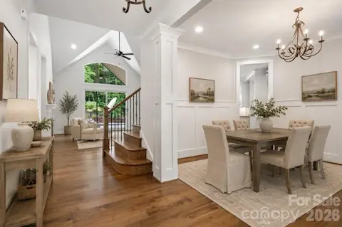 Virtually staged dining area and entry