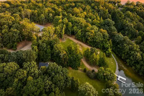Arial View of Property and Waterfront Lot with Prepped Future Homesite