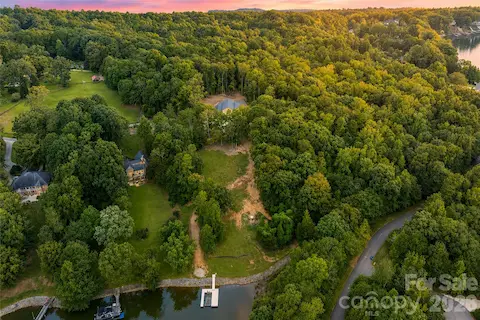 Arial View of Property and Waterfront Lot with Prepared Future Homesite