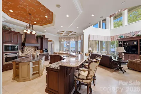 Retractable glass doors slide into the wall for indoor-outdoor living.
