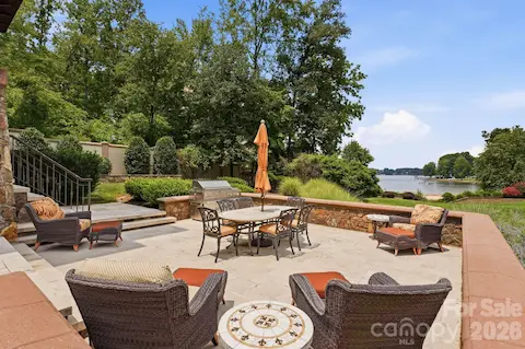 Guest house outdoor grilling patio with lake views.