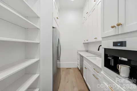 Scullery with a built in Miele coffee maker.
