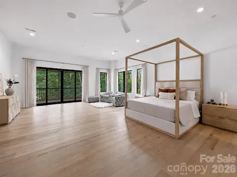 Primary suite speaks for itself- linear fireplace and a private balcony