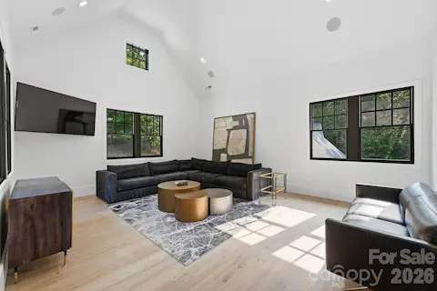 Upper level features TWO bonus rooms