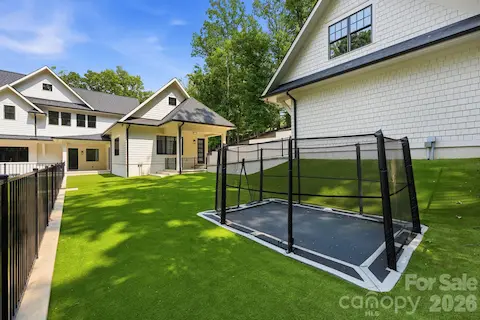 In ground trampoline and lots of green space to run around