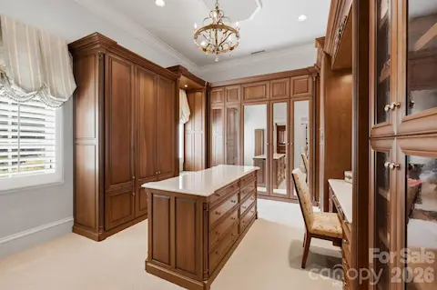 One of two primary closets.