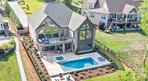 Custom new construction, waterfront, pool, big views - this is a rare one!