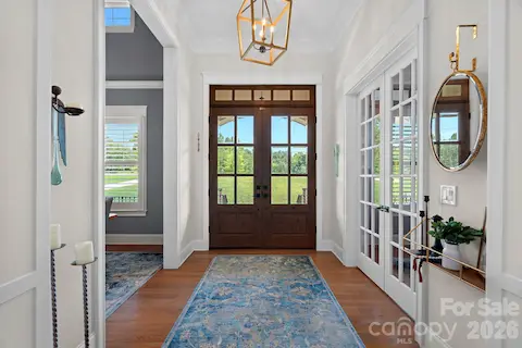 Foyer with beautiful front double doors