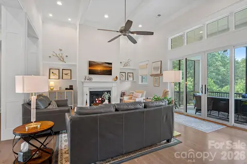 View from living area looking out onto the beautiful covered screened porch