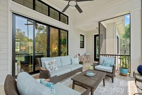 Beautiful screened in porch main floor - high ceilings!
