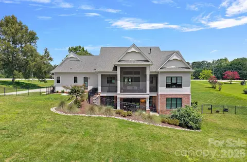 Another view of home - fenced in back yard - room for a pool!!