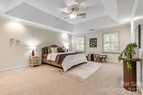 Sunny sitting area with plantation shutters creates the perfect space to relax with a book or morning coffee.