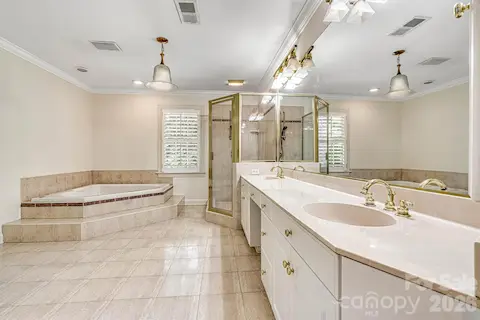 Relax and unwind in the jetted soaking tub after a long day.