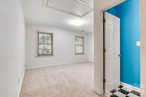 Two spacious upper-level bedrooms share a convenient Jack-and-Jill bath.