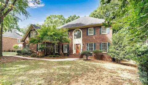 Full brick exterior offers timeless curb appeal and low-maintenance living.