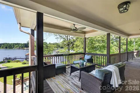 Back Porch overlooking patio and Lake Main Level