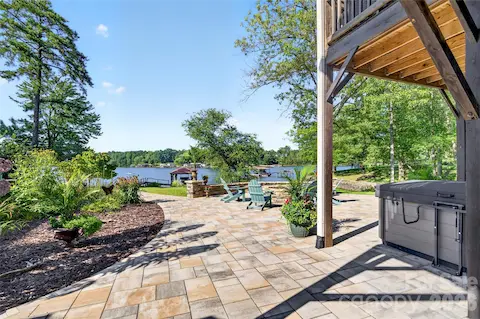 Stone Patio Lower Level with Hot Tub and Fire Pit