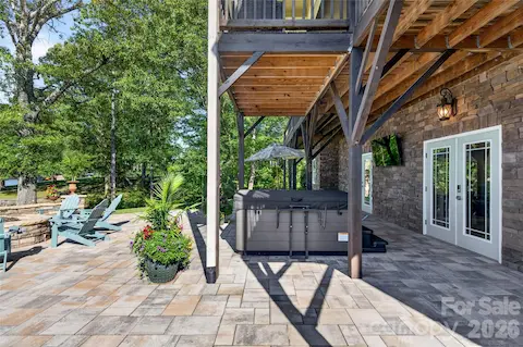 Stone Patio Lower Level with Hot Tub and Fire Pit