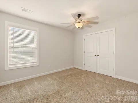 Bedroom 4 upstairs is great for an office space separated from main living areas