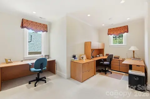 An additional upper-level room provides valuable flexibility for a second office, study, hobby room, or homework space. Two windows, generous floor area, and a quiet location make it well-suited for a variety of uses.