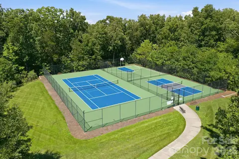 Tenis court, 2 pickleball courts and 1/2 basketball court