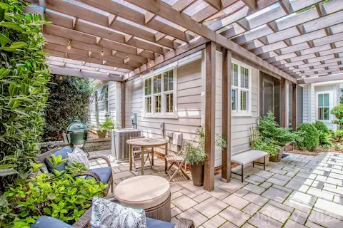 Beautiful outdoor space with flagstone patio and lush landscaping