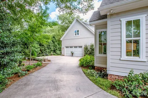 Detached garage with a carriage house/studio above