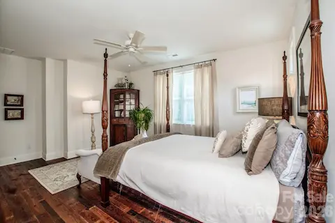 2nd  upper level  BR with a large walk in storage room off this room.