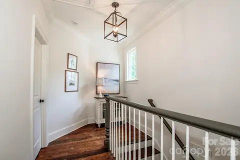 Beautiful lighting and flooring throughout this home