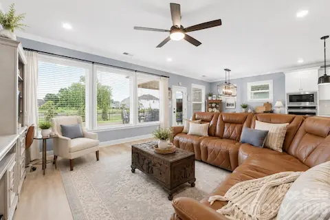 Virtually Staged Photo to show possible Decor and Ceiling Fan