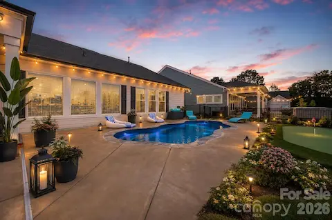 Virtually Staged to show Twilight possible Landscaping