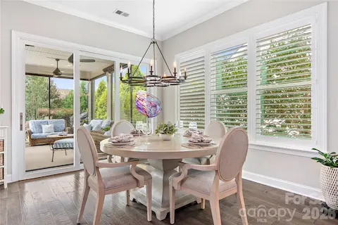 Dining Area Has Rolling Doors To Your Screened Porch, Plantation Shutters