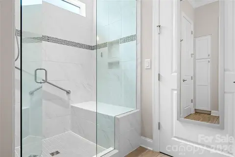 Master Bathroom Shower Has Bench