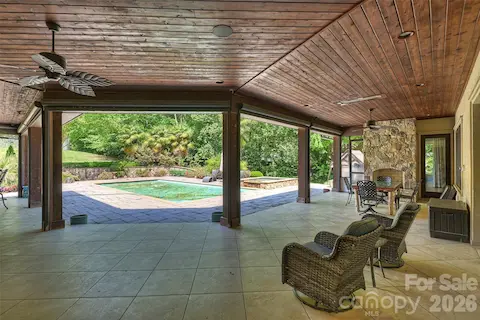 Covered porch with fireplace