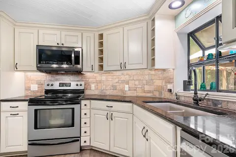 Newly upgraded cabinets and quartz countertops