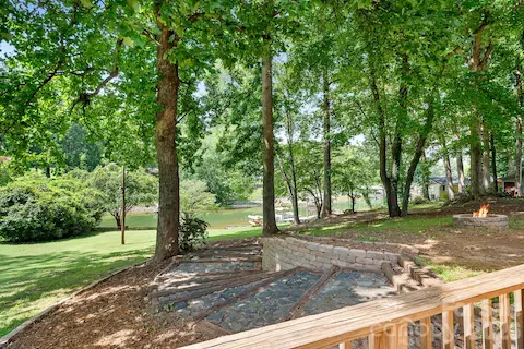 Beautiful landscaping and a fire pit. The flowerbeds are ready for you to plant whatever your heart desires