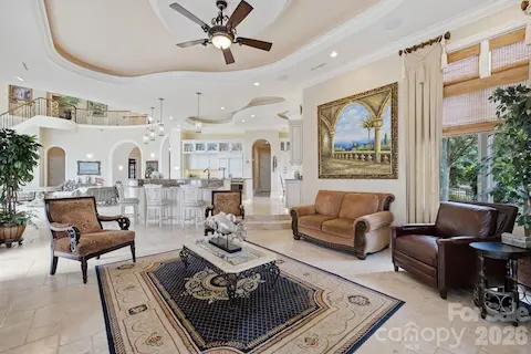 Elegant sitting area offers a comfortable private retreat with refined architectural details.