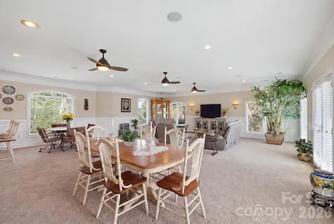 Spacious living room offers a comfortable gathering space with plenty of natural light and room to relax.